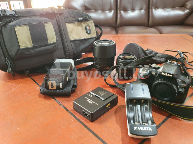 Nikon D5200 with 18-55 and 55-200 lens and flasher with rechargeable batteries for sale in Colombo